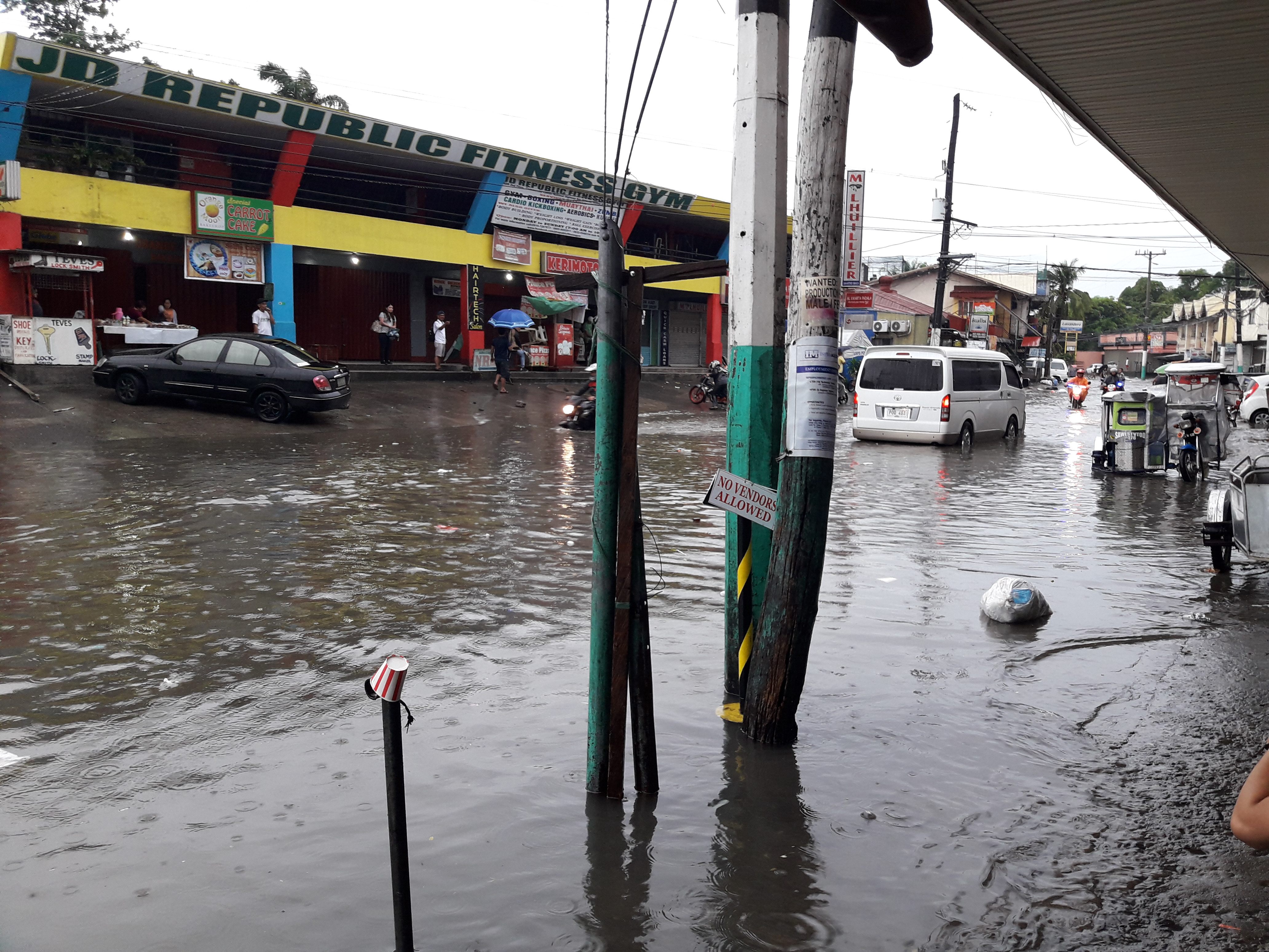 Flood Along Maharlika Drive - Photo Courtesy of Menard Duria