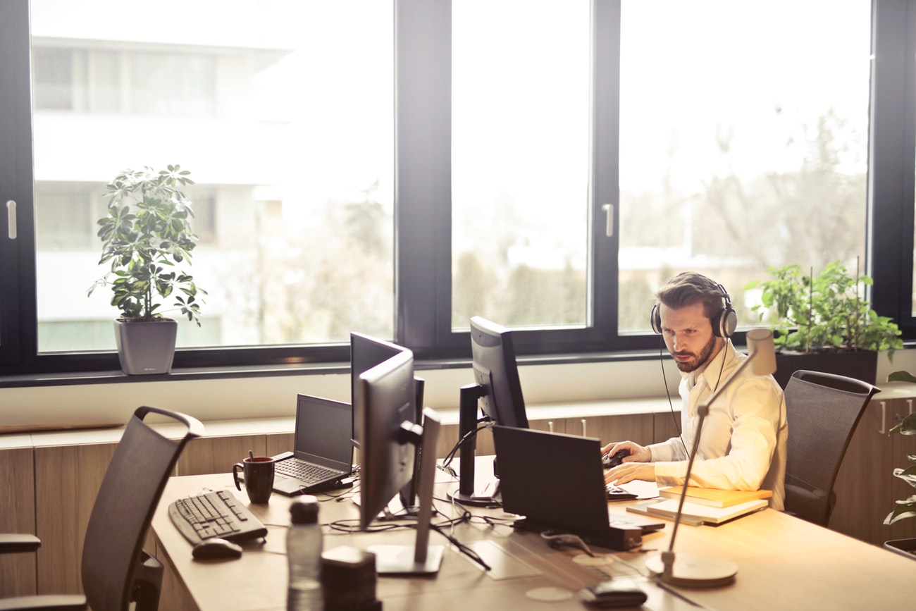 A customer Service Representative on duty in an office