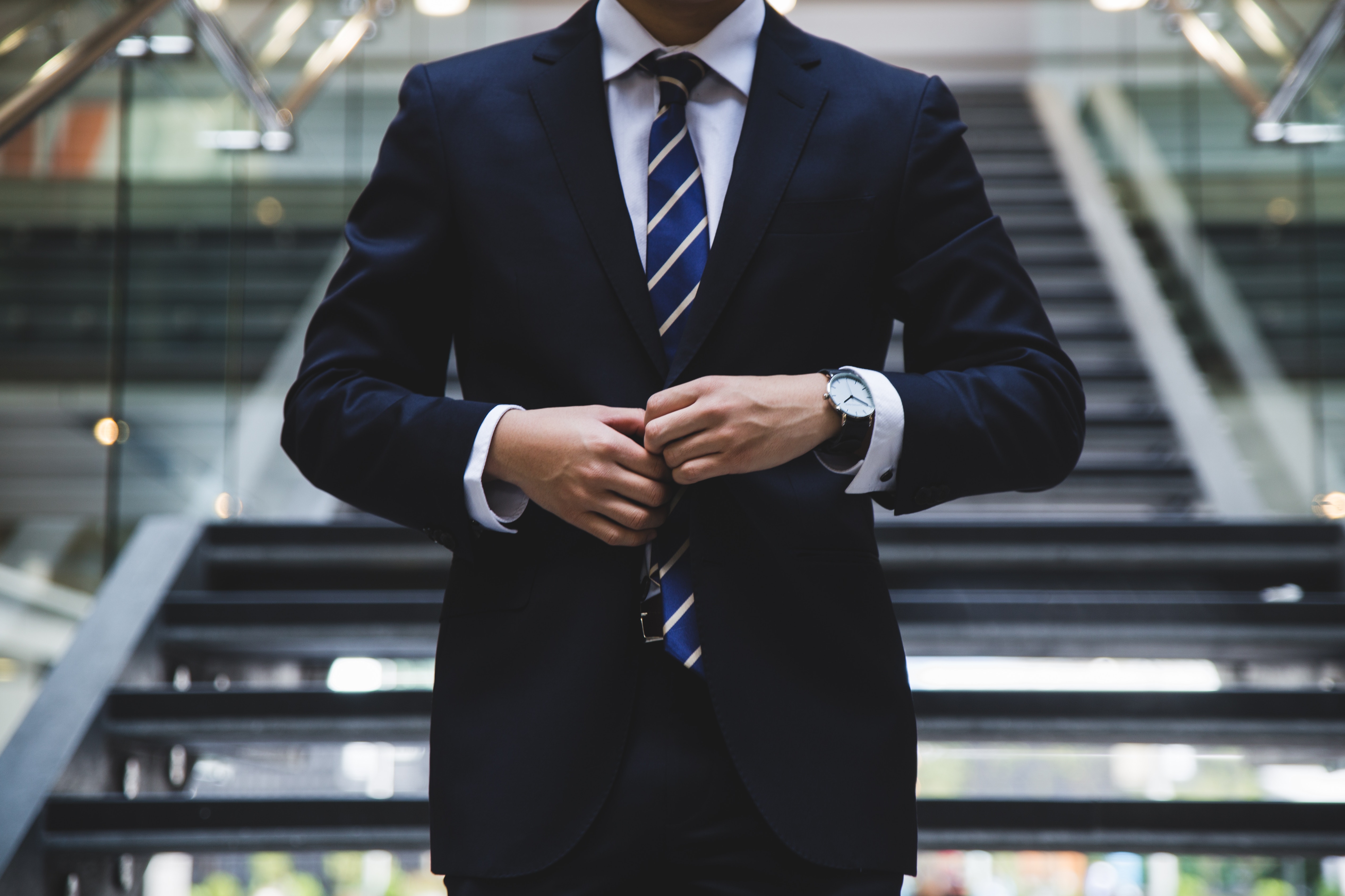 corporate ethics for gen Z torso of a man in a suit