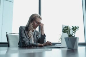 professional woman burned out at work due to no work-life balance