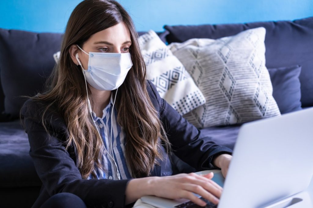 Woman using her laptop for career planning amid the COVID-19 pandemic.