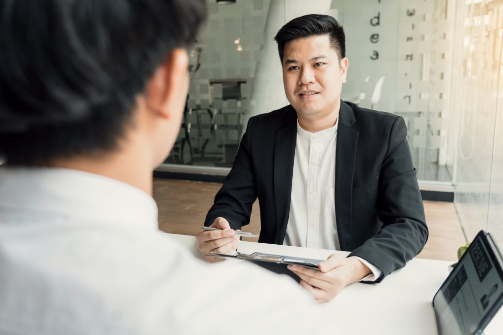 applicant explaining about their past work experience during job interview