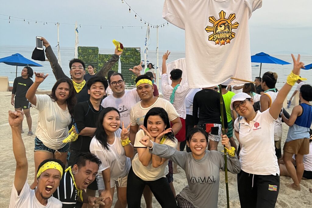 Yellow Sparrows posing for a photo after finishing the last challenge which is the Bayanihan Run