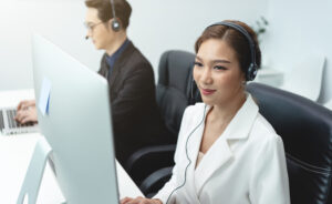 asian call center agent working mid shift