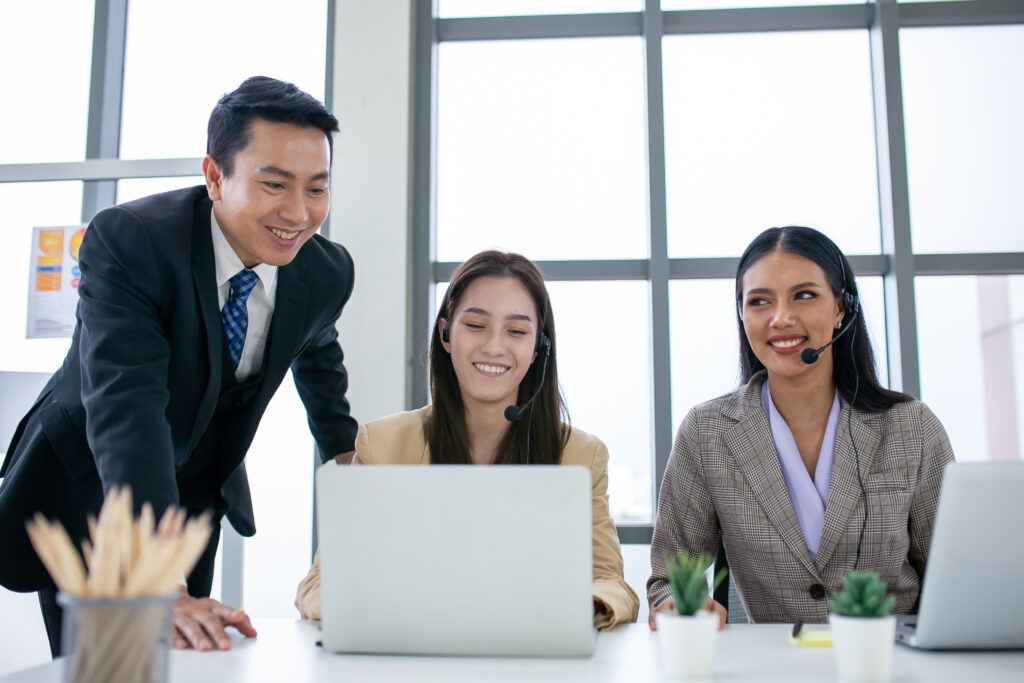 supervisors teach work to employees in the office