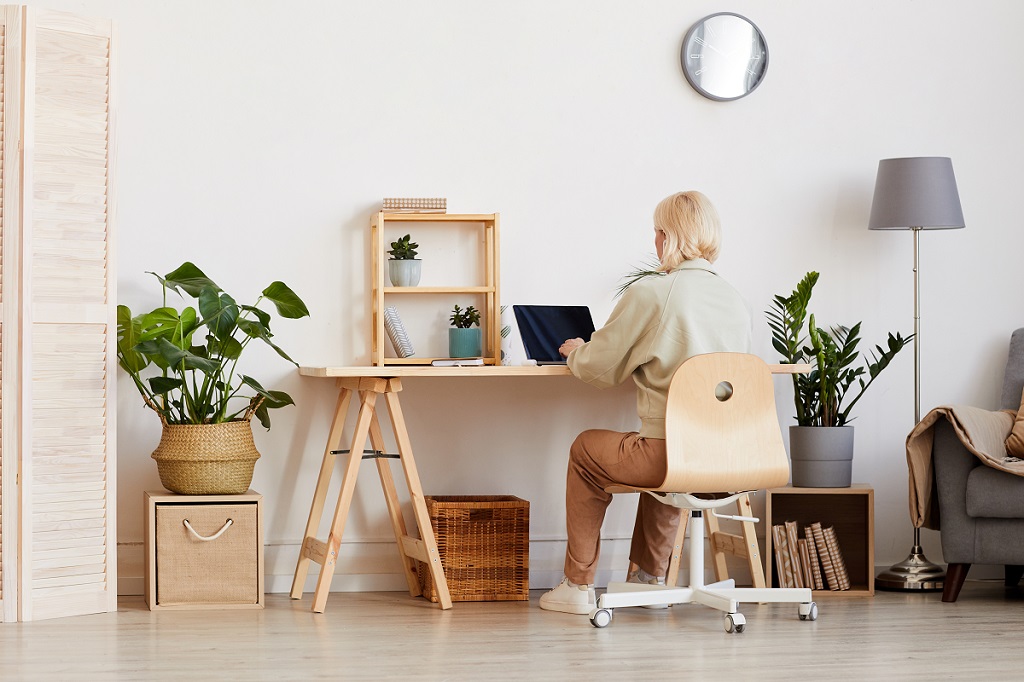 a female professional engaged in her tasks while in a work from home setup